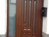 Puerta de calle PVC imitación madera panel IP10 con cristales y fijo lateral